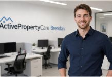 ActivePropertyCare Brendan: Why Landlords Keep Talking About Him? ActivePropertyCare Brendan standing in a modern office with company branding on the wall.