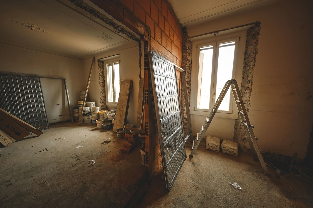 Open walls and exposed materials showing unexpected conditions during renovation